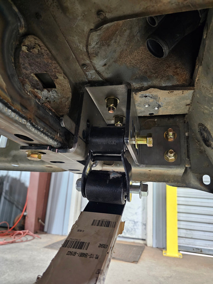 Undercarriage with suspension components and a jack.