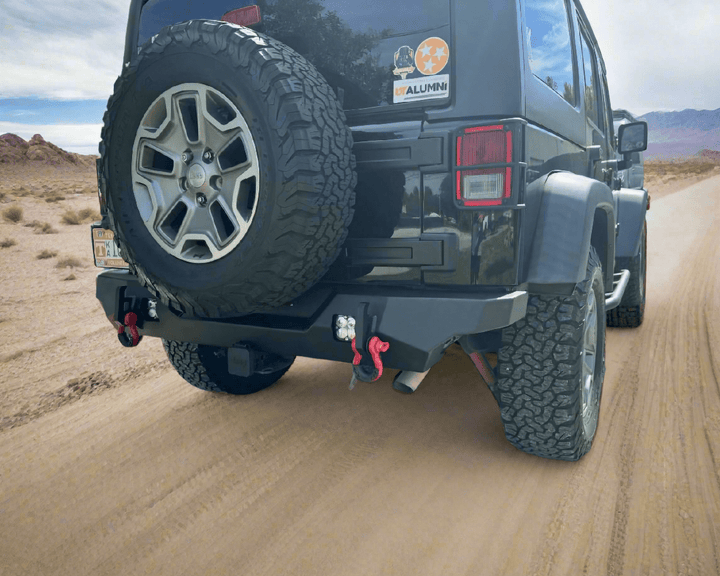 Black Jeep Wrangler on dirt road - background editor output