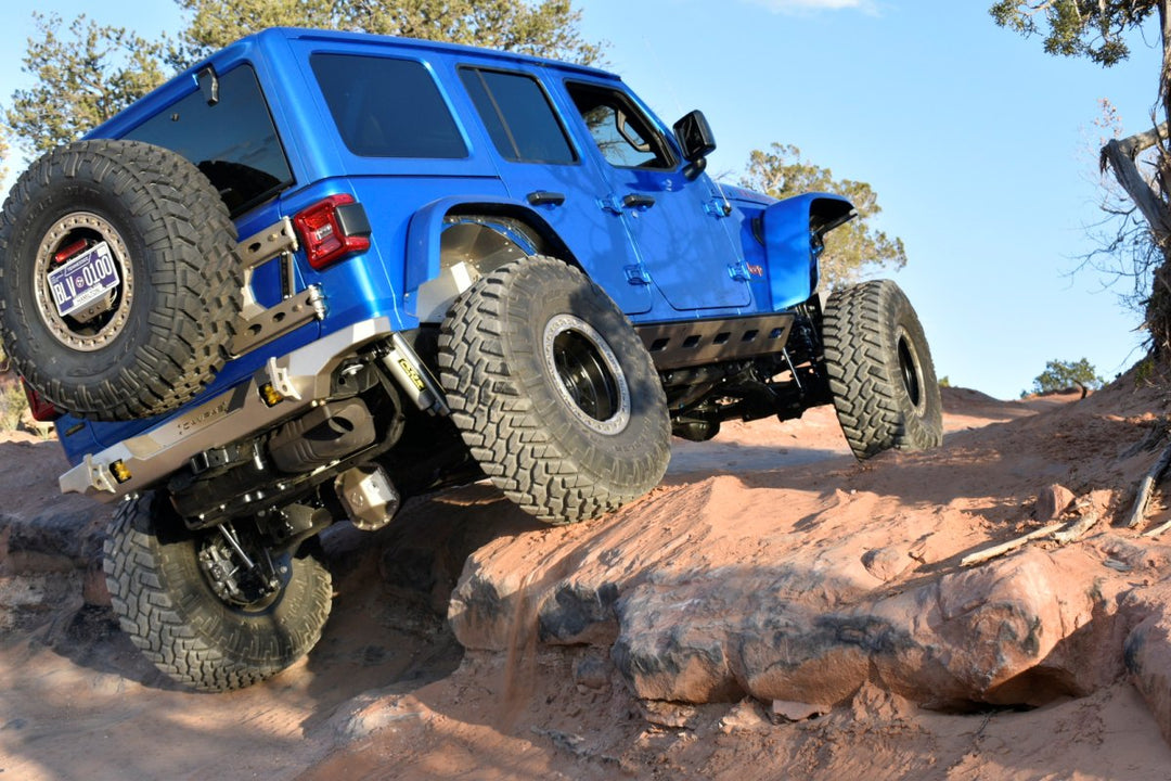 Closeup underbody view of blue Jeep Wrangler’s best Jeep Wrangler fender flares.