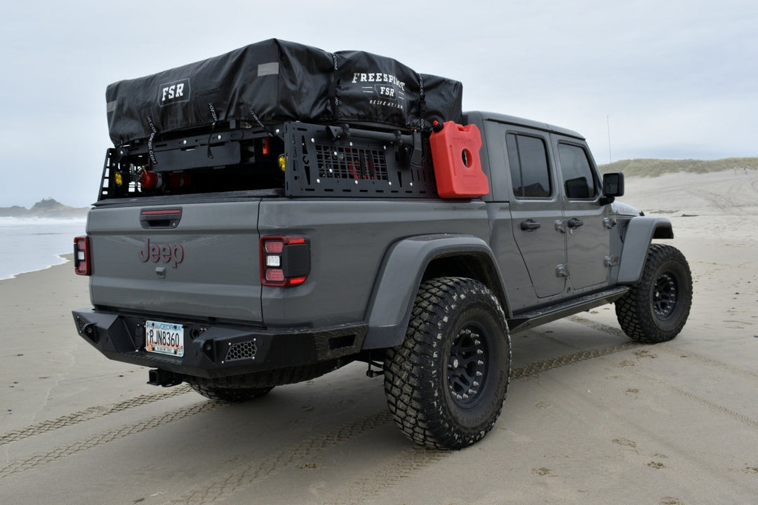 Jeep on a beach, built to handle real trail use, as part of a discussion on where Jeep parts come from.