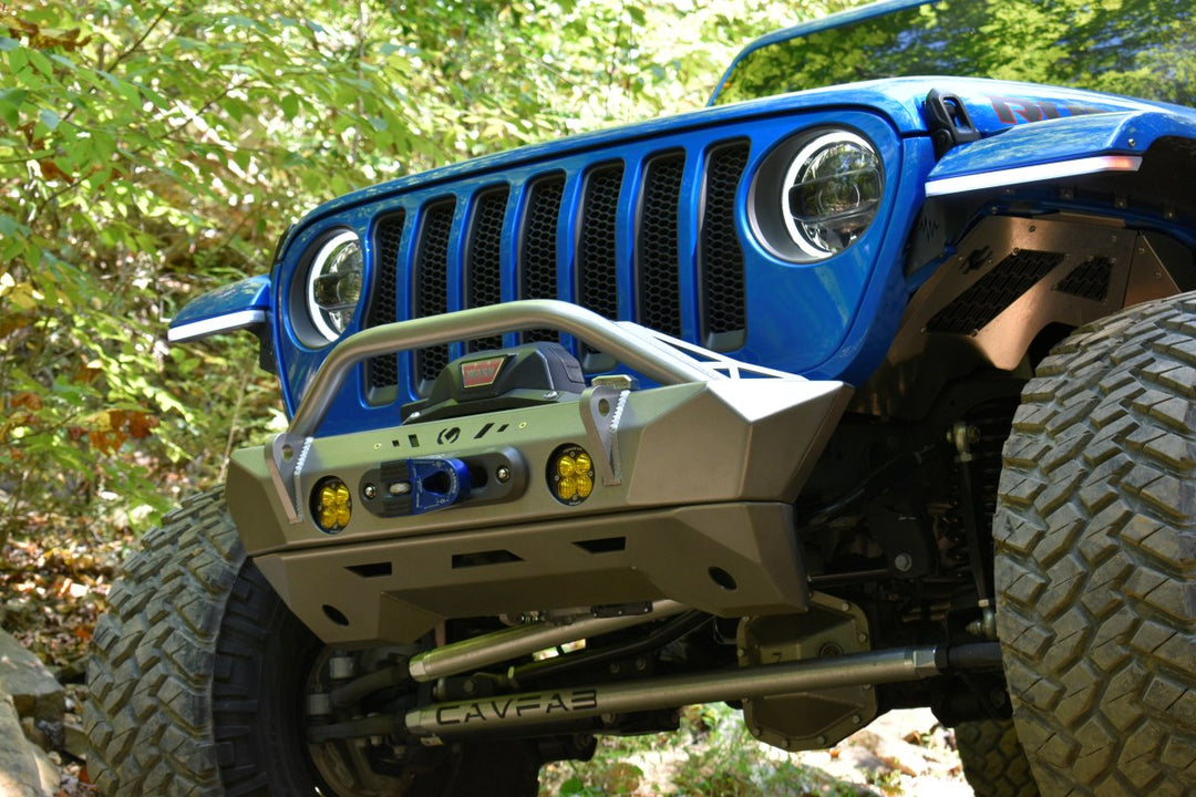 Modified Jeep Wrangler front end with heavy-duty bumper and winch, representing upgrades from the best Jeep Wrangler years.