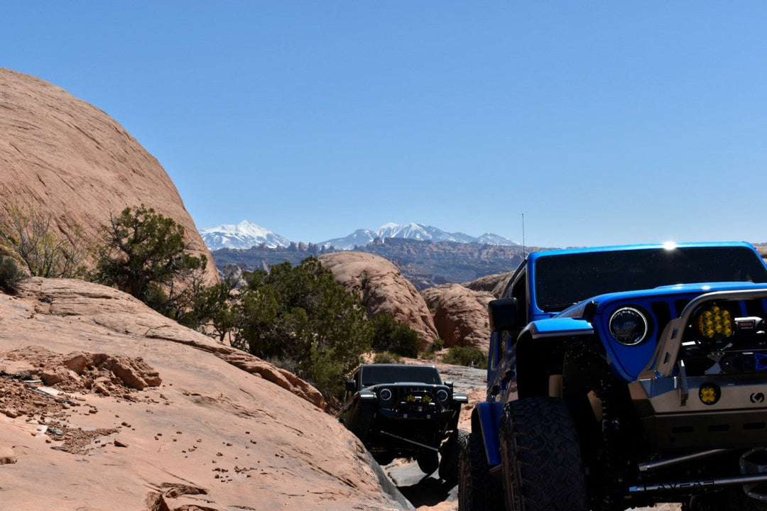 Modified Jeep on a rocky canyon trail for a Jeep Willys vs Rubicon comparison
