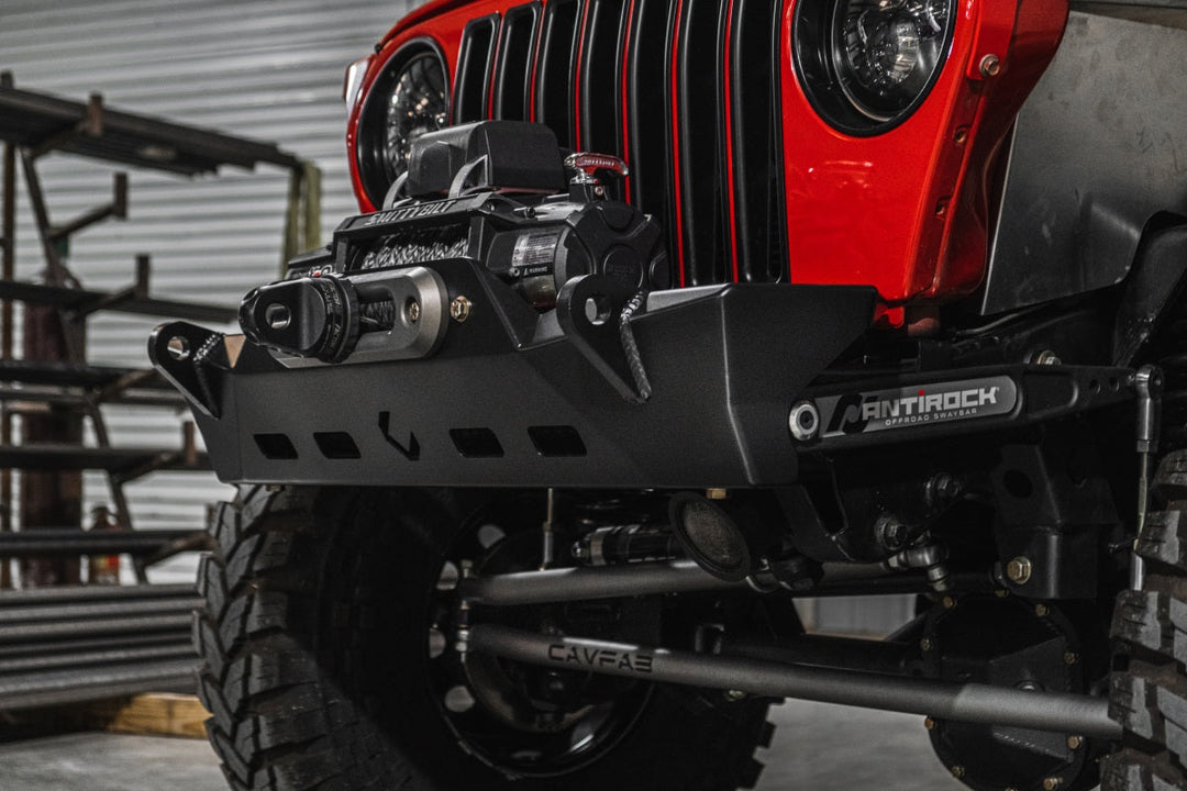 Red Jeep Wrangler in the shop getting the best upgrades for Jeep Wrangler.