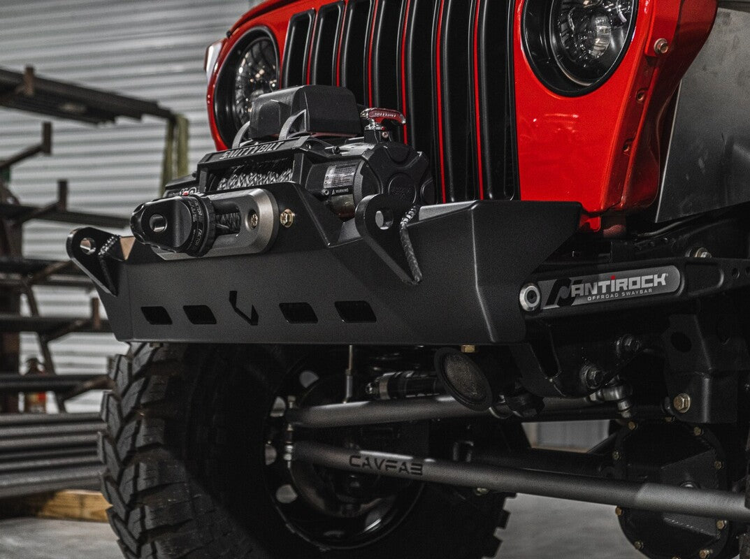 closeup of a red Jeep TJ to compare the Jeep YJ vs TJ